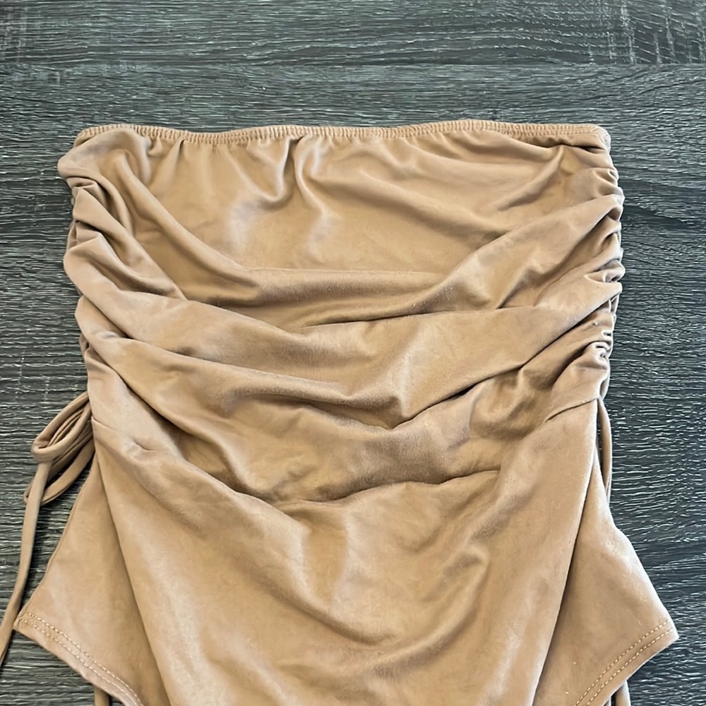 ruffled sleeveless bodysuit